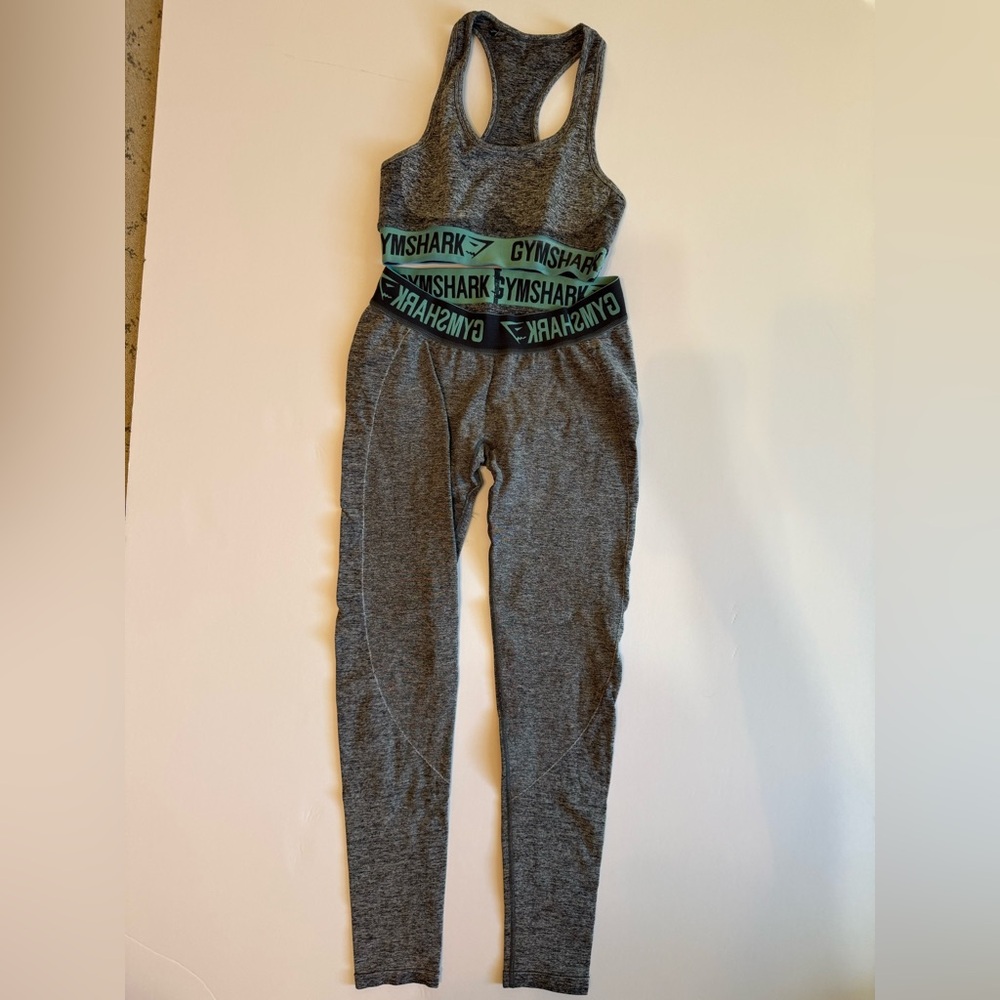 Gymshark Gray Leggings and Sports Bra Set with Black and Turquoise Waistband